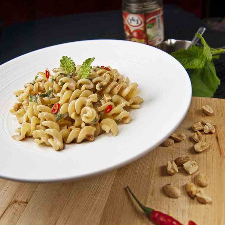 Aromatic peanut sauce over pasta