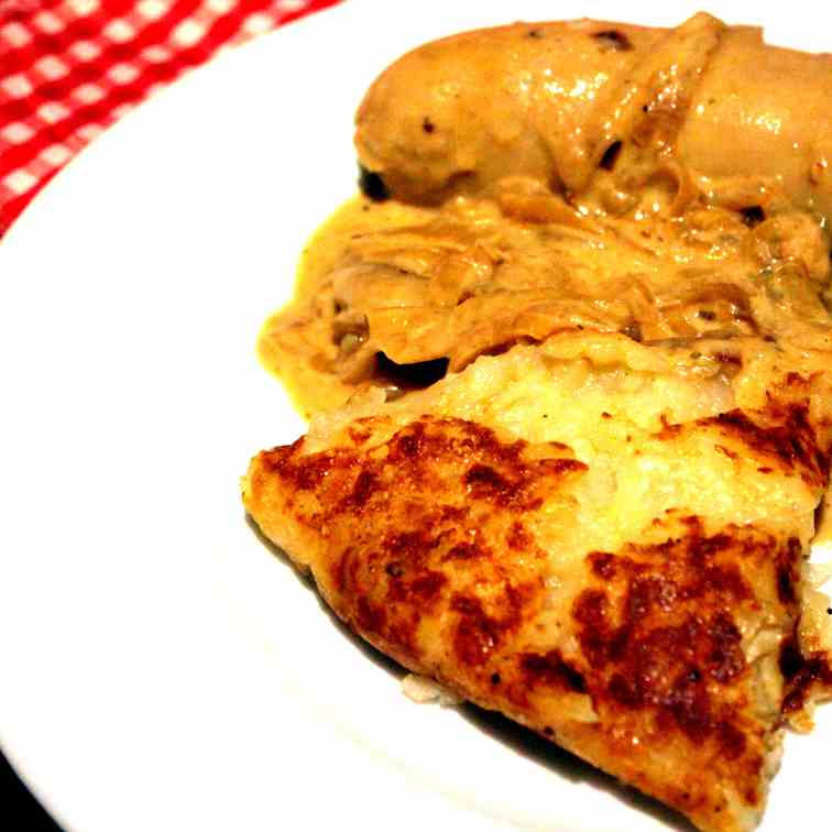 Roesti with Bratwurst and Onion Sauce